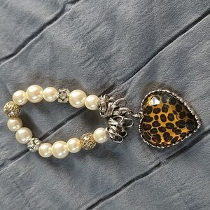 Betsey Johnson Pearl bracelet with leapord heart